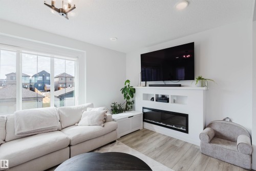 118 Secord Drive, Edmonton, AB - Indoor Photo Showing Living Room With Fireplace