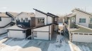 The property features a modern exterior design with mixed siding and stone accents - 79 Silverstone Drive, Stony Plain, AB  - Outdoor 