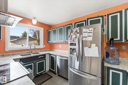 4808 21 Avenue, Edmonton, AB - Indoor Photo Showing Kitchen With Double Sink