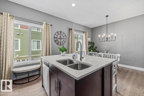 9 2003 Rabbit Hill Road, Edmonton, AB - Indoor Photo Showing Kitchen With Double Sink