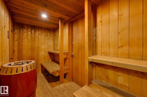 This property features a sauna with light-toned wooden paneling on the walls and ceiling - 1202 9909 110 Street Nw, Edmonton, AB - Indoor Photo Showing Other Room
