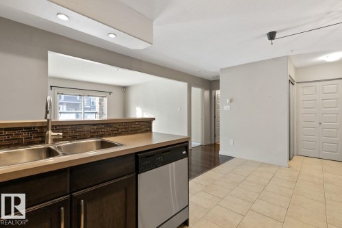#106 11615 Ellerslie Rd, Edmonton, AB - Indoor Photo Showing Kitchen With Double Sink