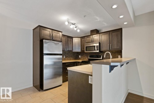 #106 11615 Ellerslie Rd, Edmonton, AB - Indoor Photo Showing Kitchen