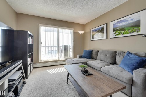 424 5951 165 Avenue, Edmonton, AB - Indoor Photo Showing Living Room
