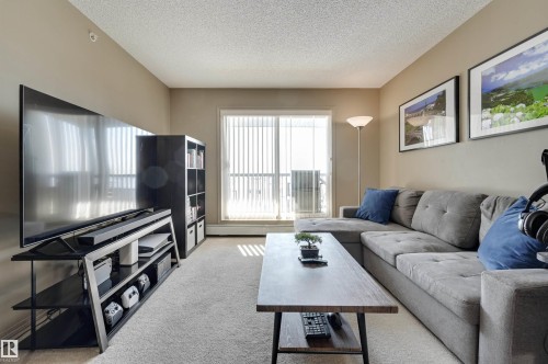 424 5951 165 Avenue, Edmonton, AB - Indoor Photo Showing Living Room