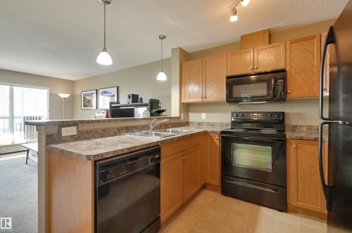 424 5951 165 Avenue, Edmonton, AB - Indoor Photo Showing Kitchen With Double Sink