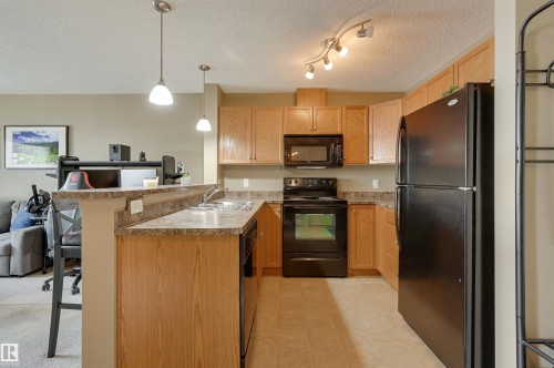 424 5951 165 Avenue, Edmonton, AB - Indoor Photo Showing Kitchen With Double Sink