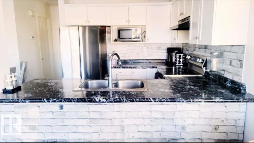33 249 Edwards Drive, Edmonton, AB - Indoor Photo Showing Kitchen With Stainless Steel Kitchen With Double Sink With Upgraded Kitchen
