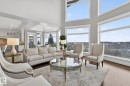 Spacious living area featuring large windows that provide extensive views of the landscape - 1413 Woodward Crescent, Edmonton, AB  - Indoor Photo Showing Living Room 
