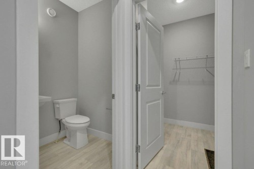 2-piece bathroom on main floor - 1909 Davidson Wynd, Edmonton, AB - Indoor Photo Showing Bathroom