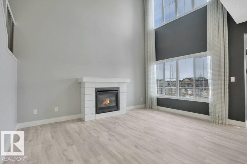 1909 Davidson Wynd, Edmonton, AB - Indoor Photo Showing Living Room With Fireplace
