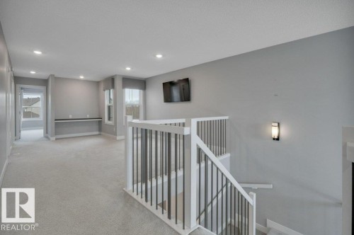 Leading into Bonus Room - 1909 Davidson Wynd, Edmonton, AB - Indoor Photo Showing Other Room