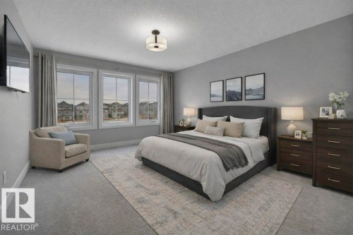 With pond views. Virtually staged. - 1909 Davidson Wynd, Edmonton, AB - Indoor Photo Showing Bedroom