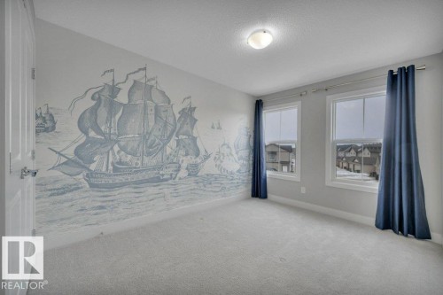 Large bedroom - south facing - 1909 Davidson Wynd, Edmonton, AB - Indoor Photo Showing Bedroom