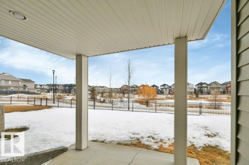 Poured patio - walk-out basement - 1909 Davidson Wynd, Edmonton, AB - Outdoor With Exterior