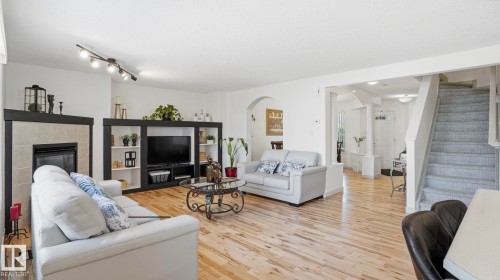 1310 Barnes Close, Edmonton, AB - Indoor Photo Showing Living Room With Fireplace