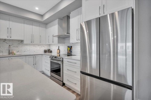 404 7463 May Common Nw, Edmonton, AB - Indoor Photo Showing Kitchen With Stainless Steel Kitchen With Upgraded Kitchen