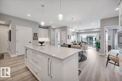 404 7463 May Common Nw, Edmonton, AB - Indoor Photo Showing Kitchen With Upgraded Kitchen