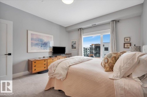 404 7463 May Common Nw, Edmonton, AB - Indoor Photo Showing Bedroom