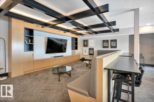LARGE SCREEN TV FOR OWNER USE OR DURING MANY OF THE OWNER SCHEDULED WATCH EVENTS - 404 7463 May Common Nw, Edmonton, AB - Indoor