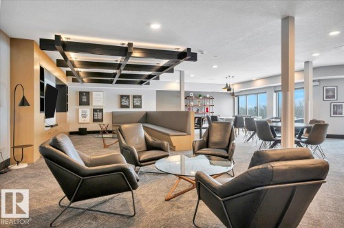 404 7463 May Common Nw, Edmonton, AB - Indoor Photo Showing Living Room