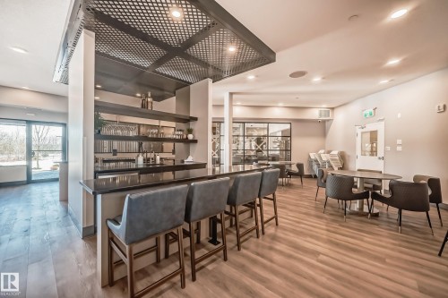 OWNERS AMENITY - 2 BARS WITH FRIDGES AND SINKS - 404 7463 May Common Nw, Edmonton, AB - Indoor Photo Showing Dining Room