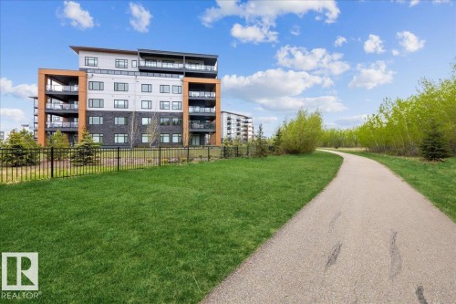 MILES OF WALKING PATHS RIGHT OUTSIDE OF THE BUILDING DOORS ADJACENT TO MACTAGGART SANCTUARY - 404 7463 May Common Nw, Edmonton, AB - Outdoor