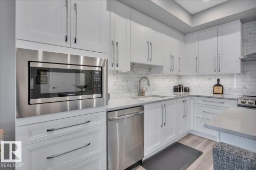 404 7463 May Common Nw, Edmonton, AB - Indoor Photo Showing Kitchen With Upgraded Kitchen