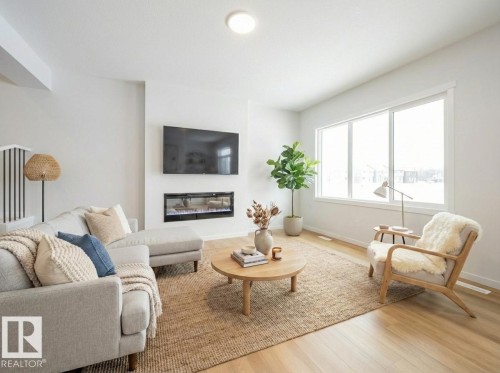 19430 22A Avenue, Edmonton, AB - Indoor Photo Showing Living Room With Fireplace