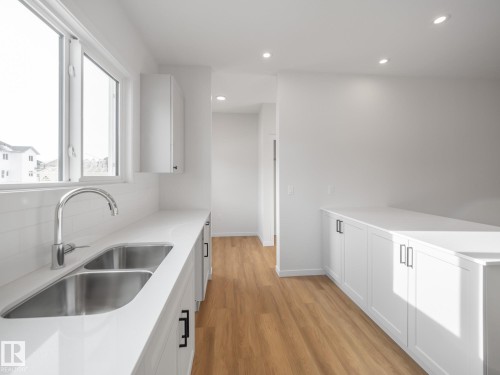 631 173 Avenue, Edmonton, AB - Indoor Photo Showing Kitchen With Double Sink