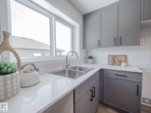 6 Brougham Drive, Ardrossan, AB - Indoor Photo Showing Kitchen With Double Sink