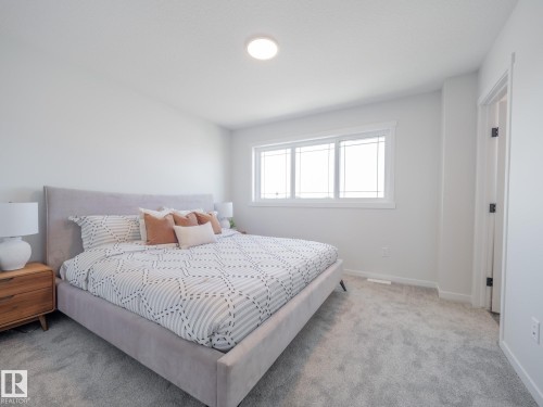 6 Brougham Drive, Ardrossan, AB - Indoor Photo Showing Bedroom