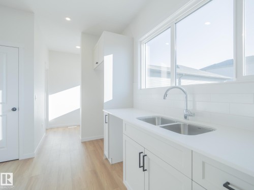 17218 4 Street, Edmonton, AB - Indoor Photo Showing Kitchen With Double Sink