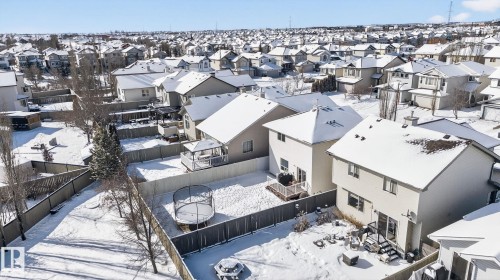 The property features a fenced backyard with a raised deck and a covered gazebo - 421 84 Street, Edmonton, AB - Outdoor