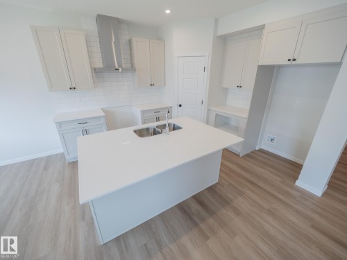 947 18 Avenue, Edmonton, AB - Indoor Photo Showing Kitchen With Double Sink