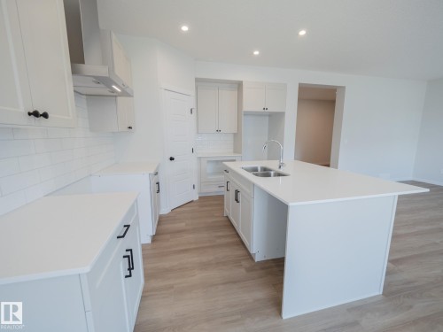 947 18 Avenue, Edmonton, AB - Indoor Photo Showing Kitchen With Double Sink
