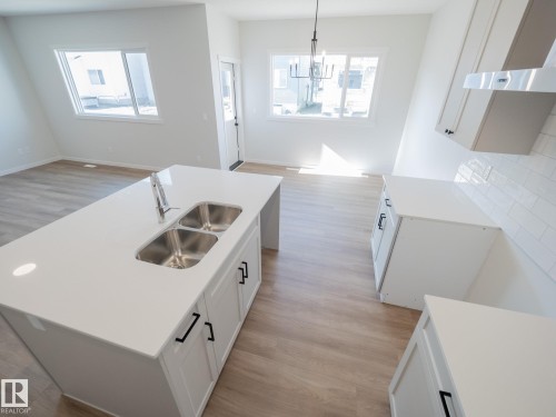 947 18 Avenue, Edmonton, AB - Indoor Photo Showing Kitchen With Double Sink