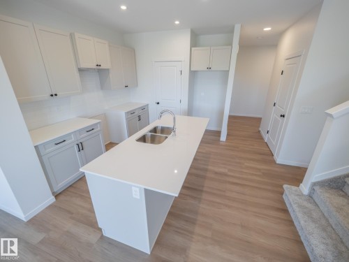9328 230 Street Nw, Edmonton, AB - Indoor Photo Showing Kitchen With Double Sink