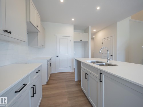 9328 230 Street Nw, Edmonton, AB - Indoor Photo Showing Kitchen With Double Sink