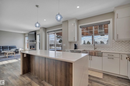 15 Promenade Point(E), Beaumont, AB - Indoor Photo Showing Kitchen With Upgraded Kitchen