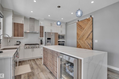 15 Promenade Point(E), Beaumont, AB - Indoor Photo Showing Kitchen With Upgraded Kitchen