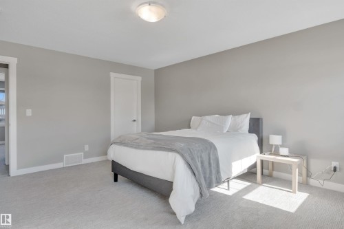 15 Promenade Point(E), Beaumont, AB - Indoor Photo Showing Bedroom