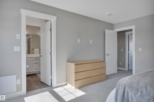 15 Promenade Point(E), Beaumont, AB - Indoor Photo Showing Bedroom