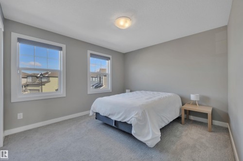 15 Promenade Point(E), Beaumont, AB - Indoor Photo Showing Bedroom