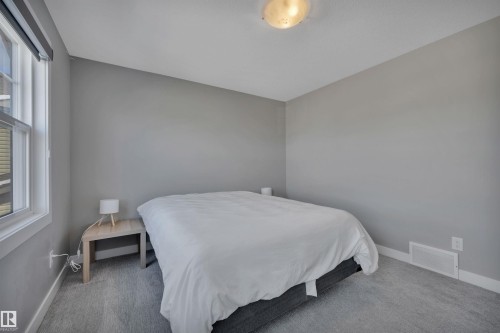 15 Promenade Point(E), Beaumont, AB - Indoor Photo Showing Bedroom
