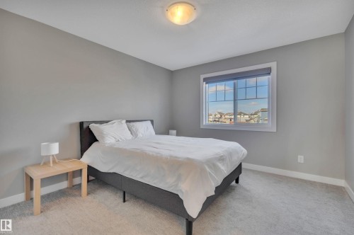 15 Promenade Point(E), Beaumont, AB - Indoor Photo Showing Bedroom