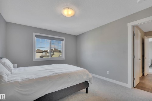 15 Promenade Point(E), Beaumont, AB - Indoor Photo Showing Bedroom