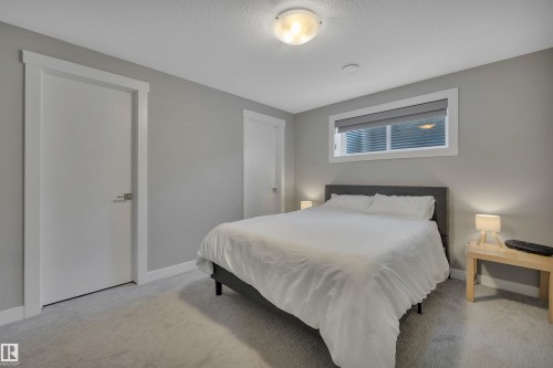 15 Promenade Point(E), Beaumont, AB - Indoor Photo Showing Bedroom