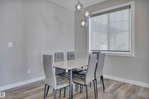 15 Promenade Point(E), Beaumont, AB - Indoor Photo Showing Dining Room
