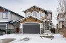 The property features a two-story exterior with light gray siding and wood-shingle accents - 21807 97 Avenue, Edmonton, AB  - Outdoor 